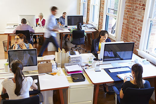 group of people working in an office setting