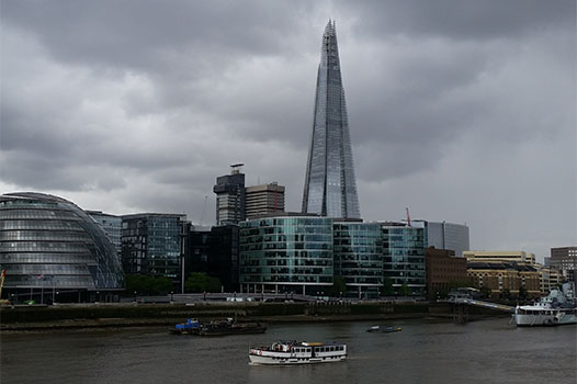 shard and surrounding building across the Thames on a cloudy day