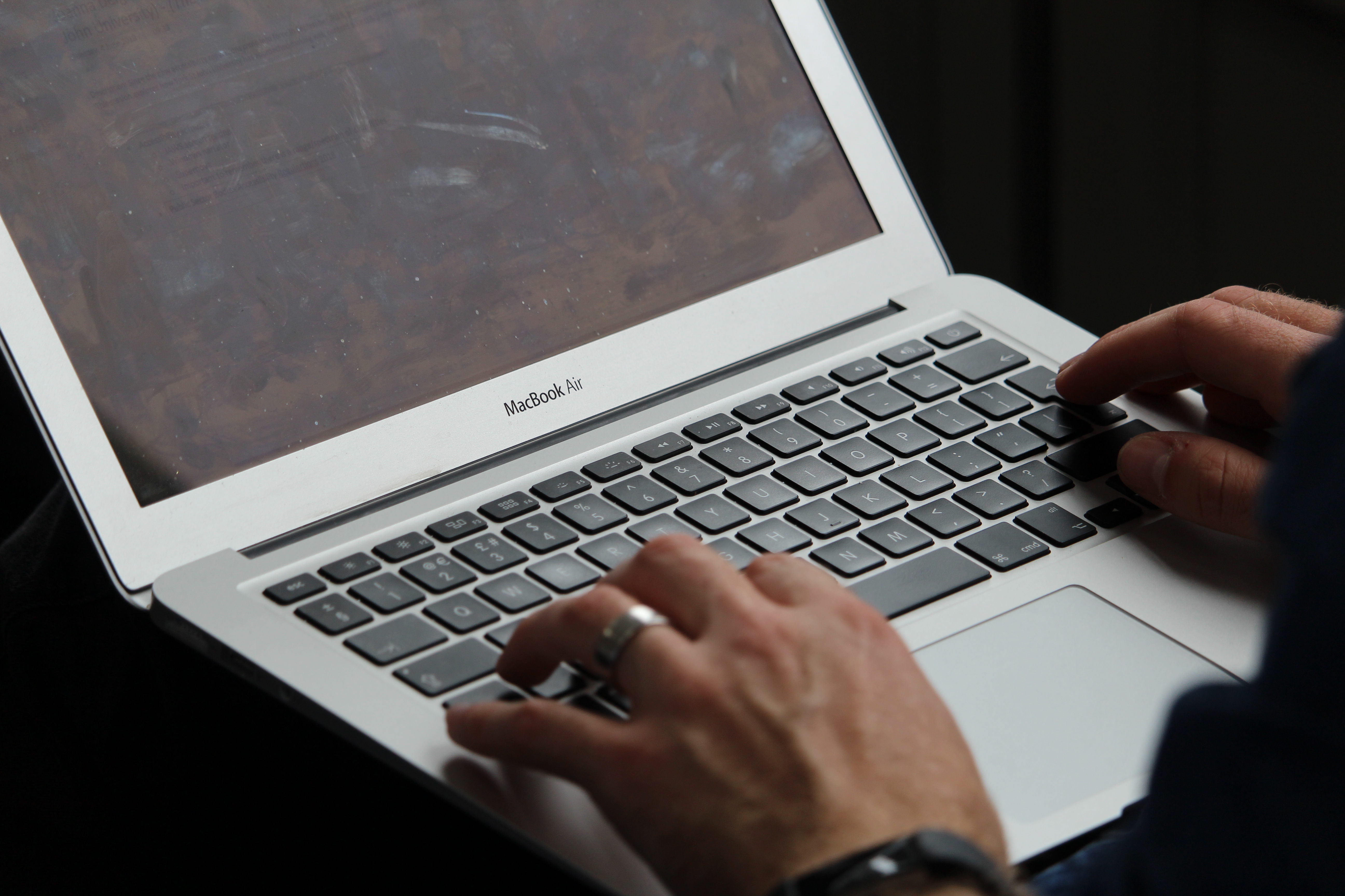 Person typing on a laptop