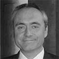 black and white photo of man smiling