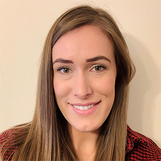 woman with long hair smiling