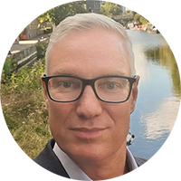 person waring glasses looking at the camera