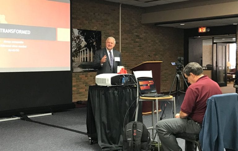 Photograph of Dr Tom Jandris giving the opening keynote at mLearn 2018