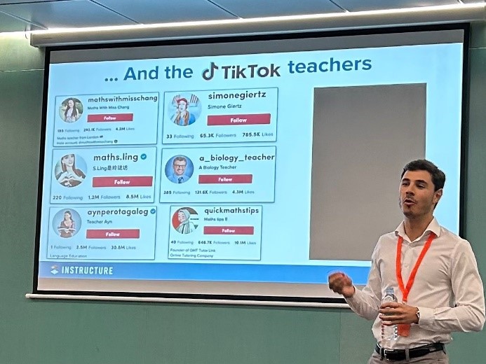person presenting in front of a screen